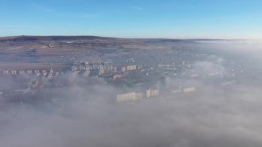 Aerial view of polluted industrial urban area. View of smog from a flying drone