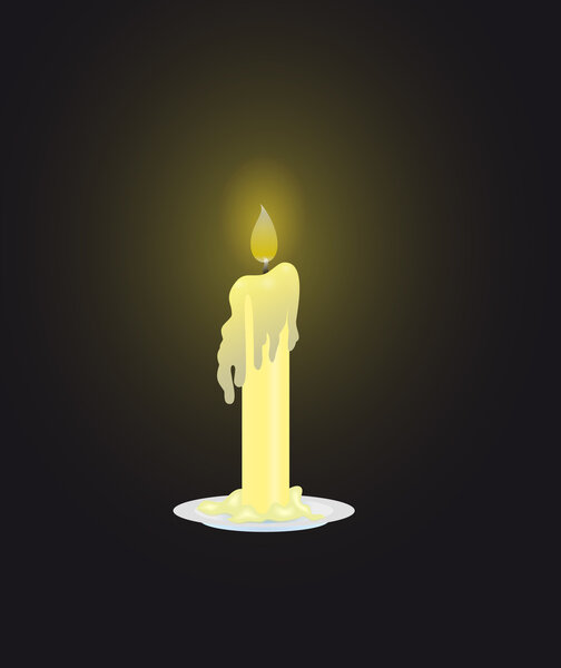 Candle on dark background