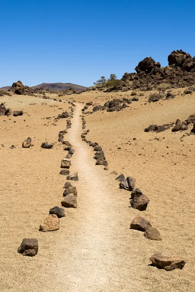 Pathway through volcanic land — Stock Photo, Image