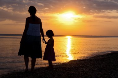 sunset Beach aile silhouettes
