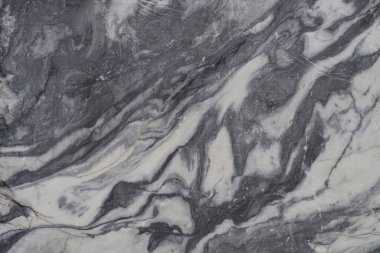 Soğuk sert yüzey, mermer. Soyut arkaplan, dalgalar. Madencilik, doğal taş yataklarının gelişimi.