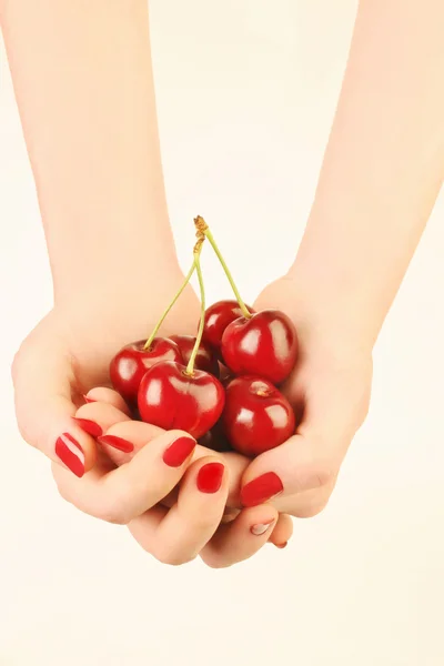 Hands with red cherry — Stock Photo, Image