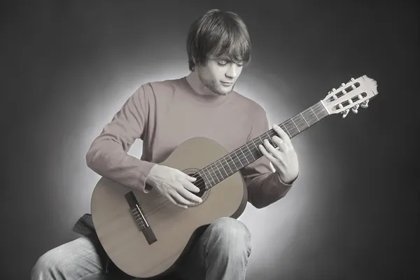 Acoustic guitar guitarist playing — Stock Photo, Image