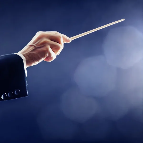 Orchestra conductor hand conducting — Stock Photo, Image