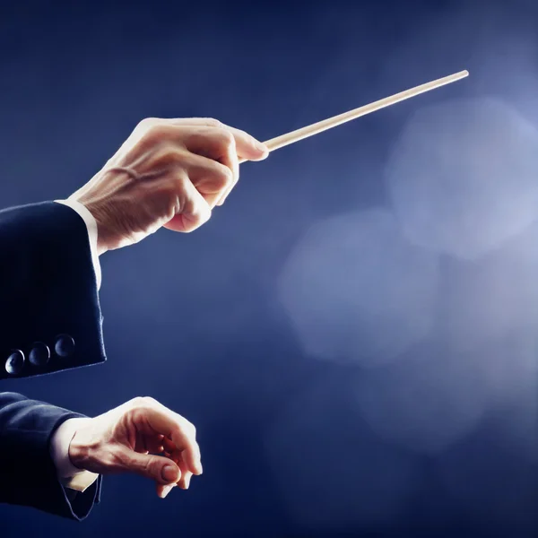 Orchestra conductor hands — Stock Photo, Image