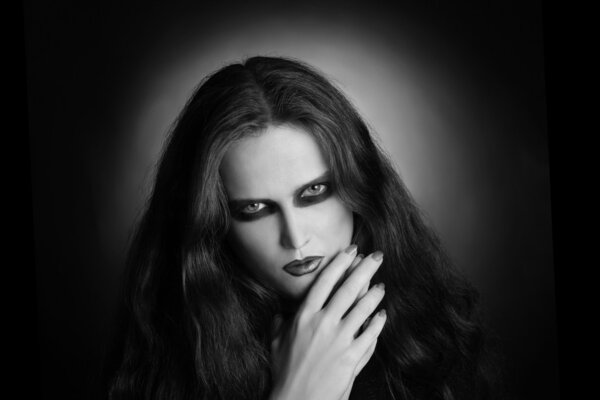 Fashion portrait of gothic woman black and white