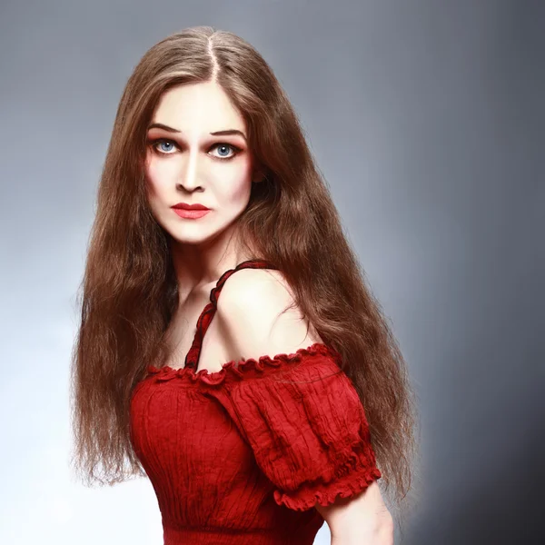 Beautiful woman in red portrait — Stock Photo, Image