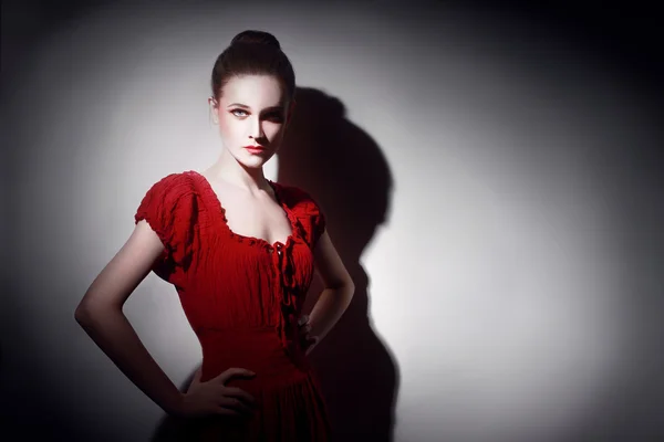 Young woman in red portrait — Stock Photo, Image