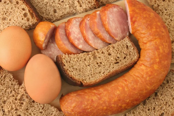 Salsicha, pão e ovos — Fotografia de Stock