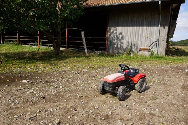 Gyerek műanyag játék traktor — Stock Fotó