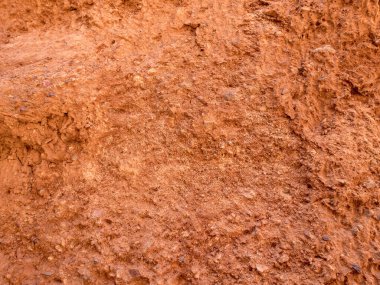 Kırmızı kil dokusu. Doğal doğal desenler. Kuru kırmızı arkaplanı kapat