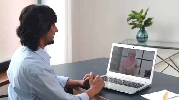 Back view multiracial middle-eastern man using computer app for video meeting — Stock Video