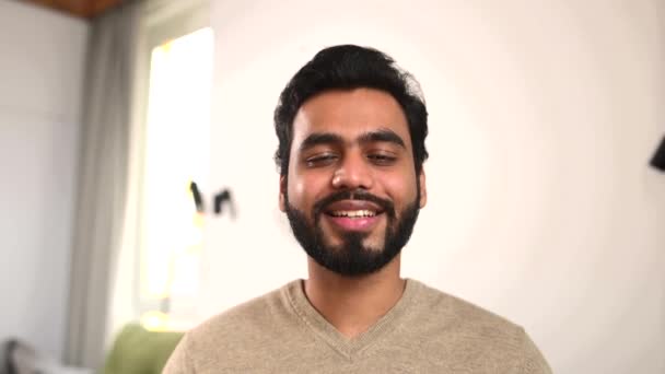 Virtual meeting with smiling and friendly multi ethnic male freelancer — Video