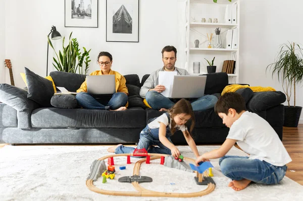 Parents Work Remotely Laptops Sitting Couch Living Room Two Sweet — Stock Photo, Image