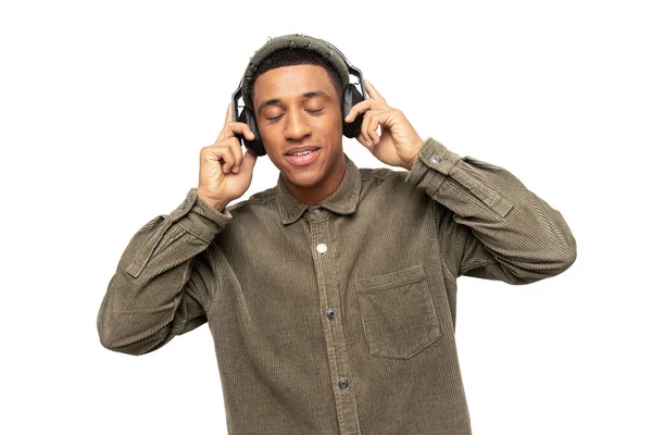 Studio Portrait Relaxed Cheerful Latin Man Wearing Holding Wireless Headphones — Stock Photo, Image