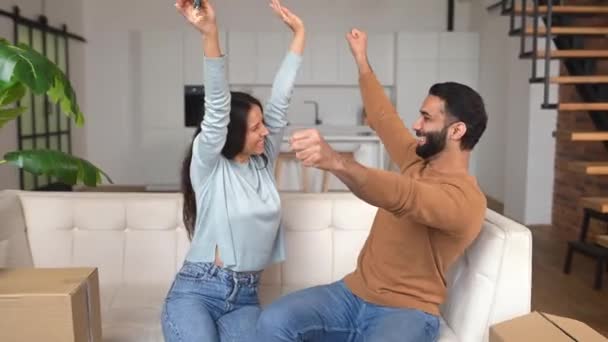 Young Indian Couple Happy Buy Apartment Sitting New Modern Apartment — Vídeo de Stock