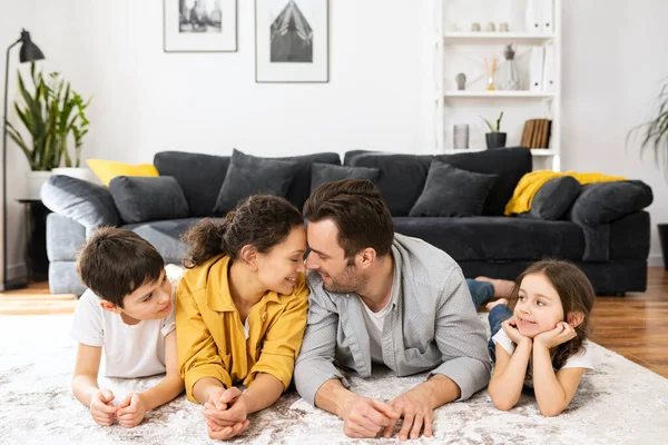 Cheerful Multiracial Family Four Mom Dad Son Toddler Daughter Laying — Stock Photo, Image