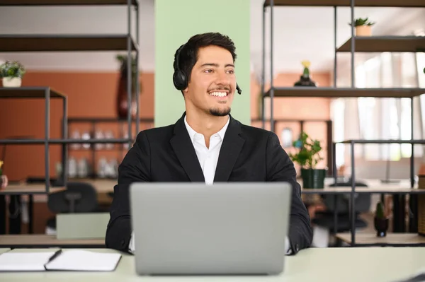 Smiling Young Hispanic Salesman Wearing Headset Holding Online Call Male — Stock fotografie
