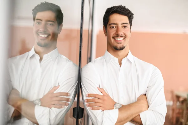 Smiling Hispanic Male Employee Wearing Smart Casual Shirt Stands Arms — 图库照片