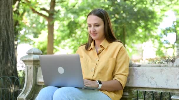 Optimistic Young Woman Using Laptop Sitting Bench Campus Area Female — Stock videók
