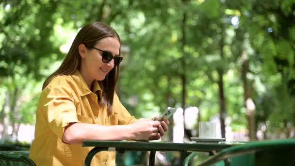 Side View Smiling Young Woman Using Smartphone Outdoors Texting Online — Vídeos de Stock