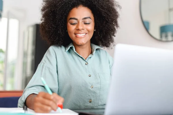 Smiling African American Female Student Sits Desk Watch Webinar Taking — стокове фото