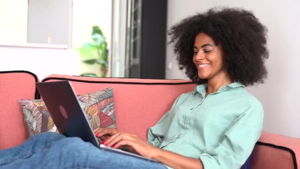African Young Woman Student Freelancer Casual Wear Sitting Couch Using — Wideo stockowe