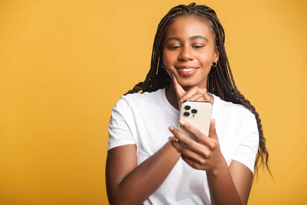 Attractive Brunette Woman Holding Smartphone Enjoying Chatting Social Networks Pondering — Stockfoto