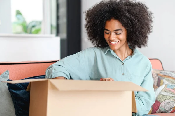 Happy Delivery Satisfied Female Customer Unpacking Cardboard Box Excited African — Stockfoto