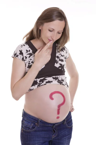 Pregnant woman with questionary mark on her belly — Stock Photo, Image