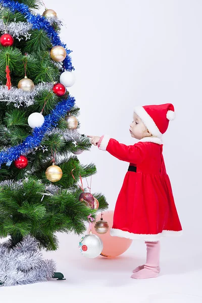 Noel Noel Baba şapkalı kız bebek — Stok fotoğraf