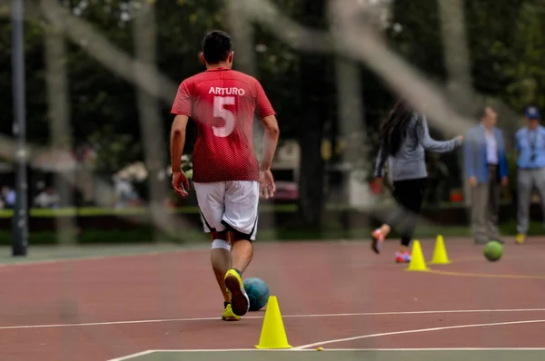 Male soccer player with his back