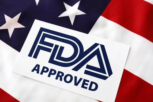 Logo FDA goedgekeurd met vlag Verenigde Staten van Amerika — Stockfoto