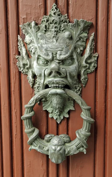 Stylish bronze door knocker — Stock Photo, Image