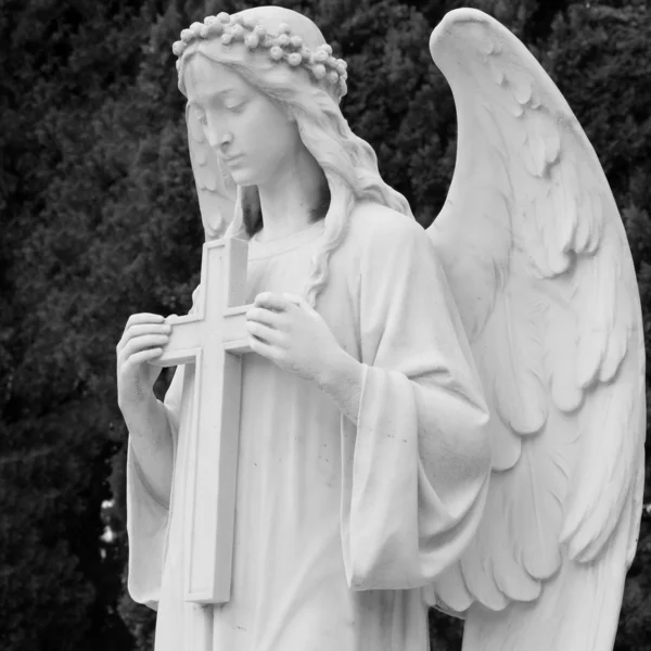 Angel holding a cross — Stock Photo, Image