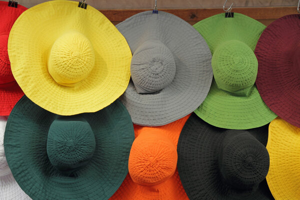 colorful woman sun hats in shop window, Florence, Italy, Europe