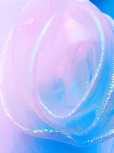 Abstrakter Hintergrund Neonfarbener Holographischer Stoff Der Form Einer Rose Gefaltet — Stockfoto