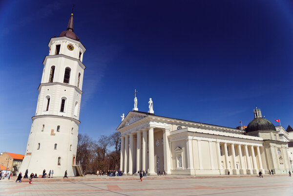 Classical cathedral with tower and crowdy Cathedral square in Vilnius, Lithuania