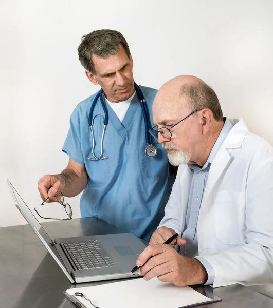 Two Senior Doctors at Laptop Computer — Stock Photo, Image