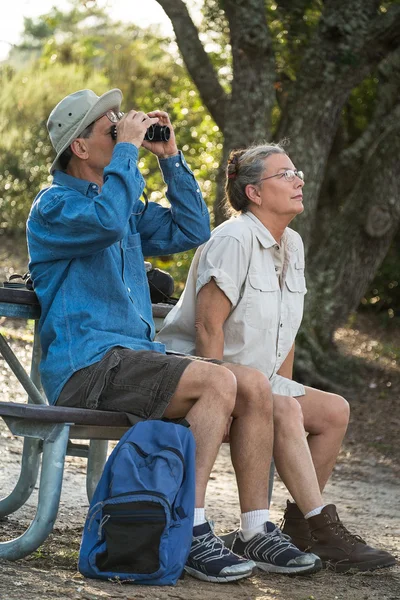 Senior Couple Hiking, Birdwatching and Camping — Stock Photo, Image