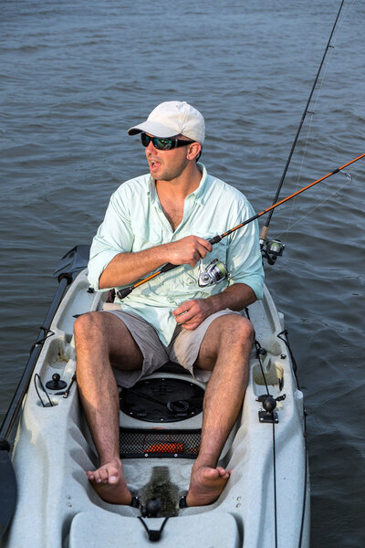 Man Fishing in Kayak