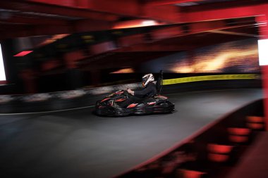 APRIL - 2022 ITALY - Milano - Electric Go kart driver speed rive indoor circuit race