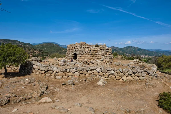 Great archaeological complex with Nuraghe di S'Ortali 'e Su Monti, village