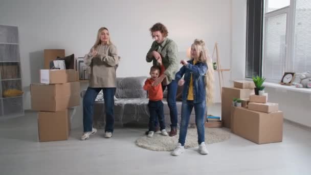 Happy New Home Owners Celebrate Relocation Family Mortgage Young Parents — Stock Video