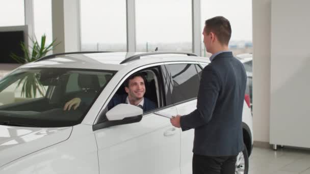 Car Purchase Automobile Dealership Professional Manager Giving New Vehicle Keys — Stock Video