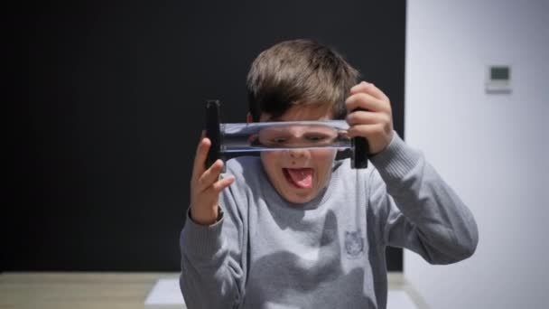 Male Child Looking Glass Celendric Lens Distorting Eye Display Science — Vídeos de Stock