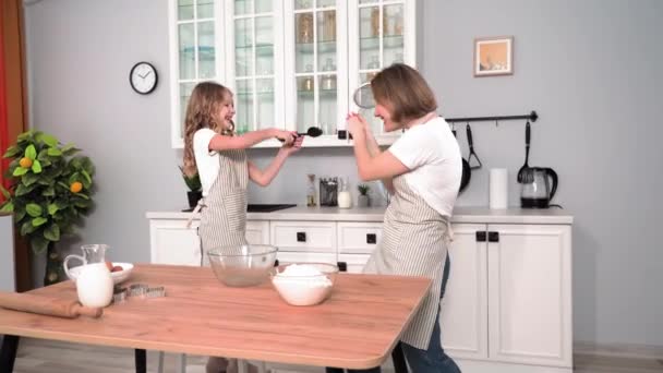 Happy Childhood Little Girl Apron Joyfully Fights Kitchen Spoons Female — Vídeo de Stock