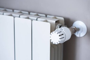 The thermostat a regulator of house heating close up