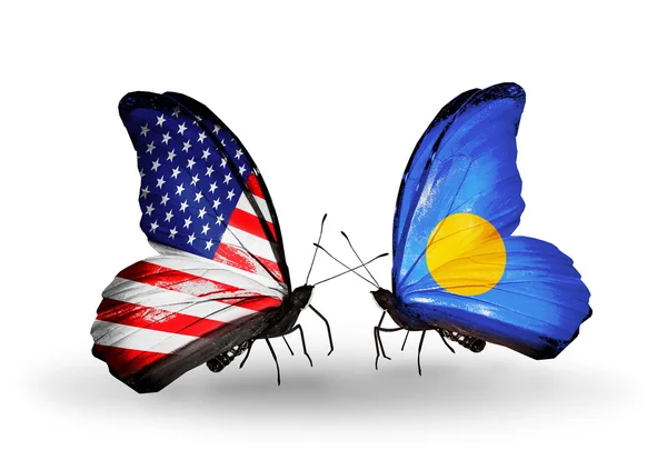 Two butterflies with flags on wings as symbol of relations USA and Palau — Stock Photo, Image