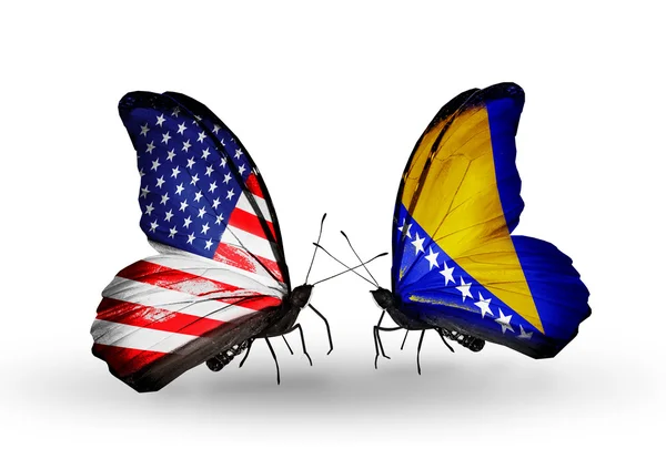 Two butterflies with flags on wings as symbol of relations USA and Bosnia and Herzegovina — Stock Photo, Image